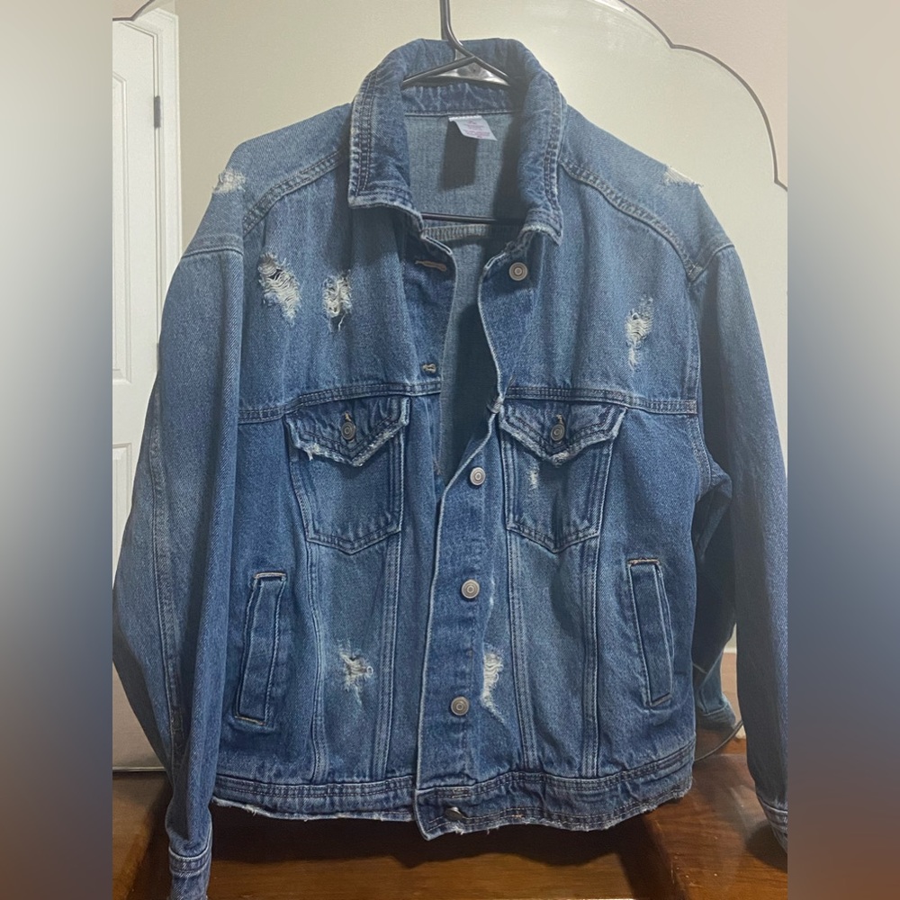 Only worn a few times. Still looks brand new, no added holes or tears.